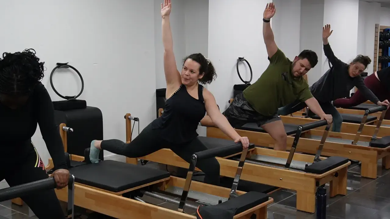 Reformer Pilates class in action in the new dedicated studio.